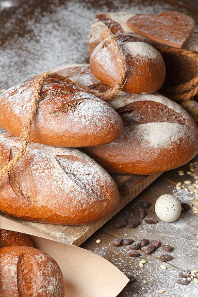 Variety of rye bread on a wooden background
