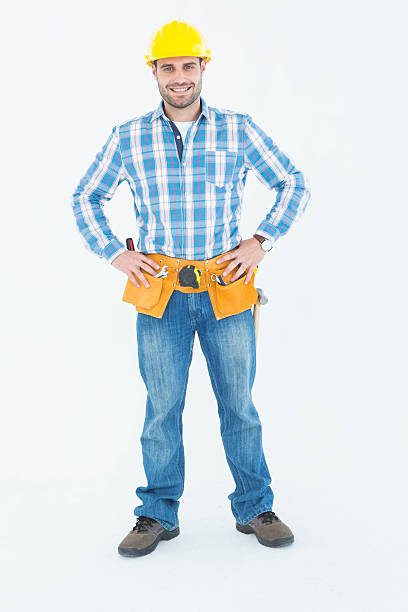 istock Confident repairman standing with hands on hips 468676666
