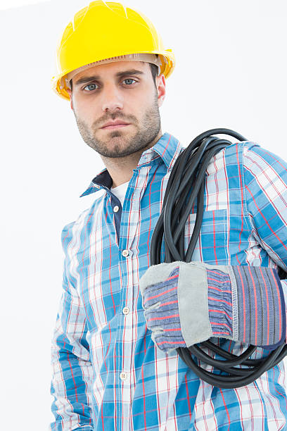istock Confident repairman carrying pipe on shoulder 468676718