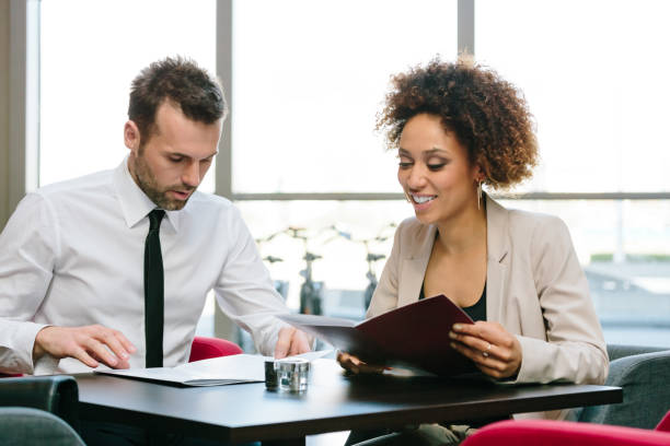 istock Two business people at lunch in restaurant 468678990