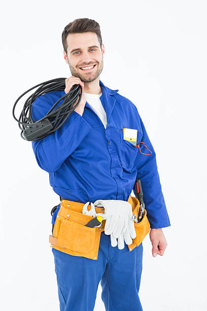 istock Happy repairman holding cable 468679000
