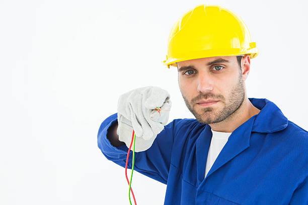 istock Confident repairman holding cables 468679100
