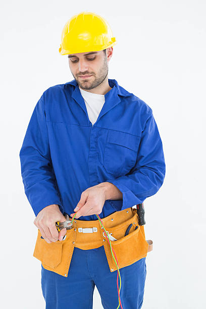 istock Male electrician cutting wires 468679120