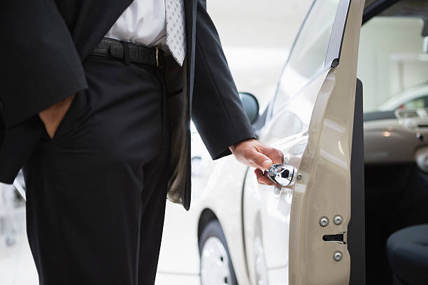 istock Man opening a car door 468679442