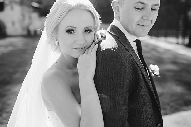 istock blonde bride with her groom 468679962