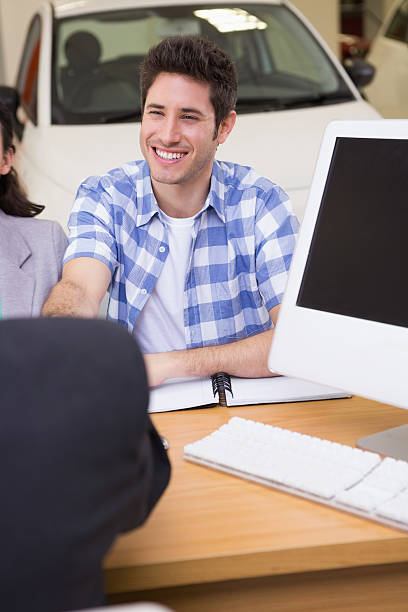 istock Smiling customer shaking a salesman hand 468680420
