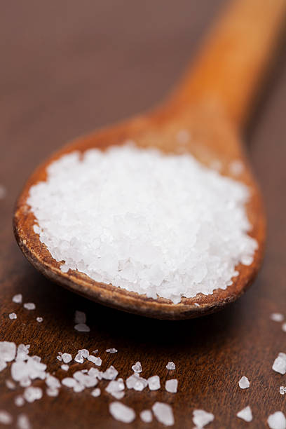 istock Ocean salt crystals on a wooden spoon 468683612
