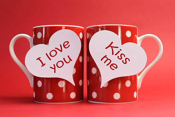 istock Red coffee mugs with love messages. 468683633