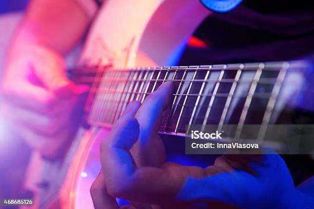 Close Up Of Hands Playing A Guitar Stock Photo - Download Image Now - Live Event, Performance Group, Guitar