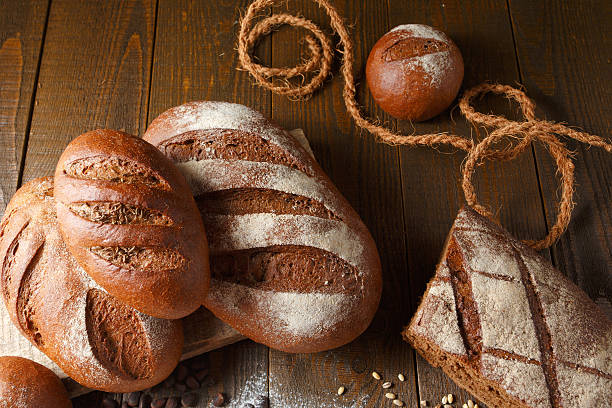 Variety of rye bread on a wooden background