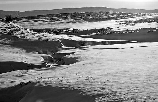 istock Snowy Barren Landscape with Bright Sun 468687020