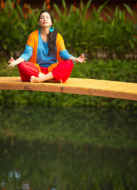 istock Woman relaxing yoga 468692222