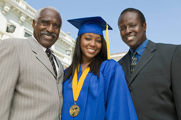 istock Graduate with Father and Grandfather 468696861