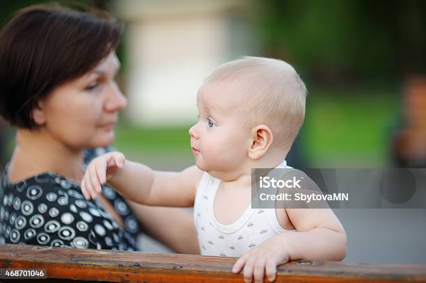 Middle Aged Woman And Her Adorable Little Grandson Stock Photo - Download Image Now - 12-17 Months, 2015, Active Seniors