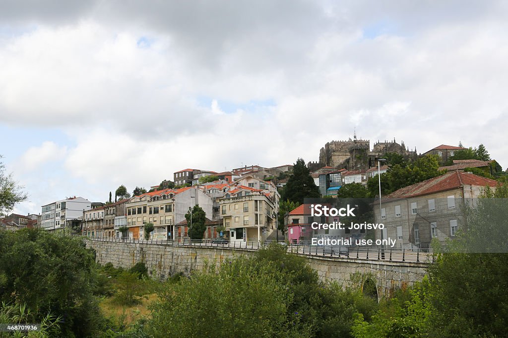 Center of Tui, Galicia, Spain Tui, Spain - August 2, 2014: Unidentified people near the Romanesque Cathedral (11th-13th Century) of Saint Mary in Tui, Galicia, Spain. 2015 Stock Photo