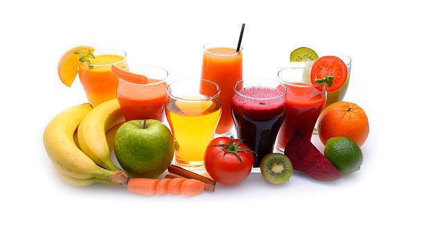 Fresh fruit and vegetable juices on white background stock photo