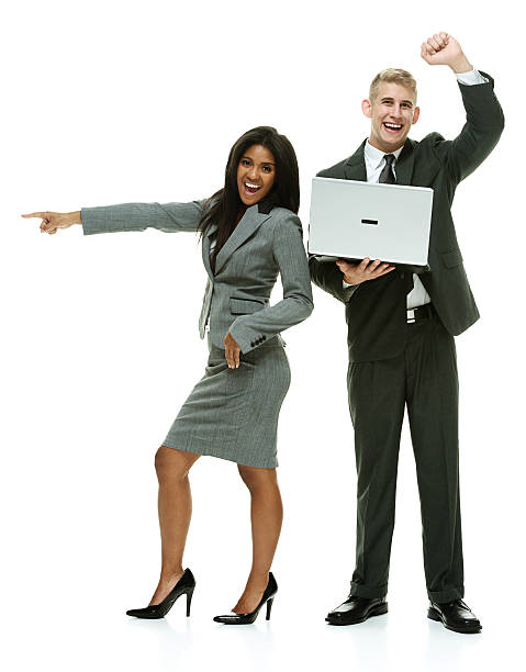 istock Happy business couple cheering and pointing 468704012