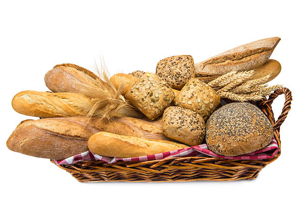 istock Basket with a bread assortment isolated on white 468704095