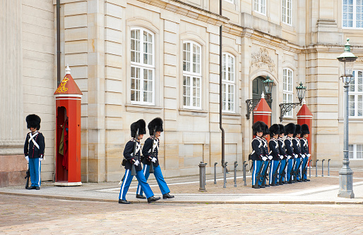 Copenhagen, Denmark Jan 1, 2023 The Royal Guard at night at the Amalienborg Castle.