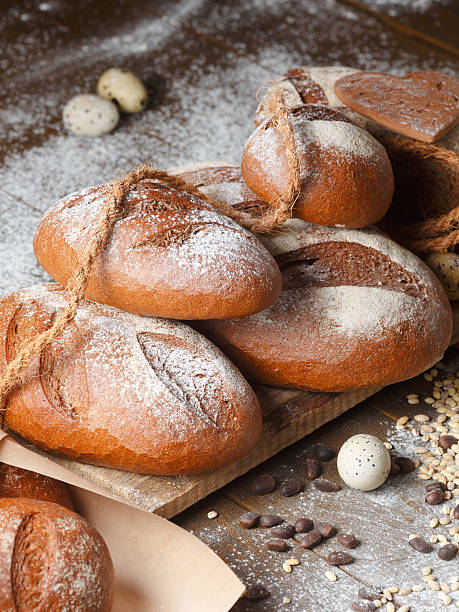 Variety of rye bread on a wooden background