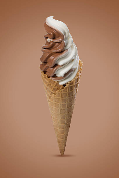 istock Chocolate and vanilla soft serve ice cream in a wafer cone 468709488