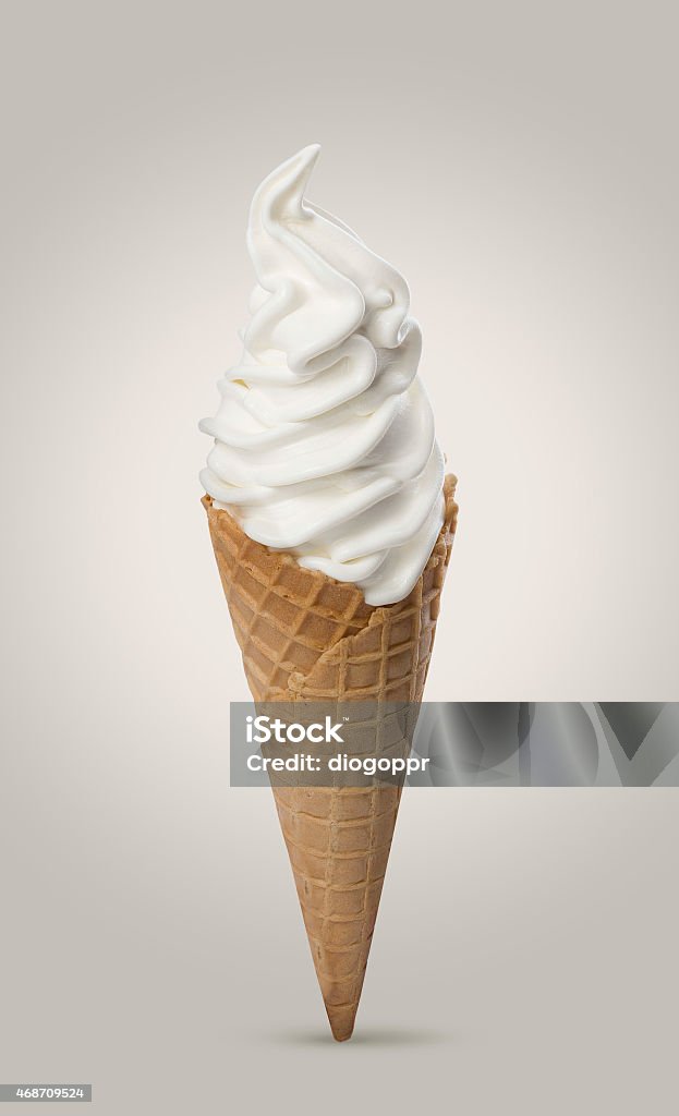 A soft-serve ice cream cone isolated on white creamy ice cream produced in machine Ice Cream Stock Photo