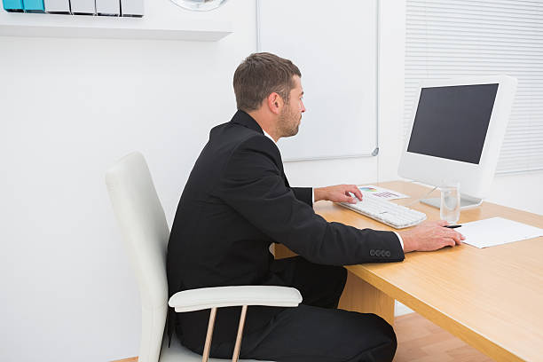 istock Businessman at desk 468710504