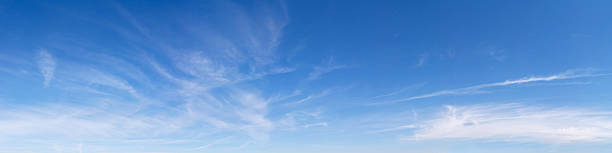 Panoramic blue sky with light clouds Panoramic sky on a sunny day. panoramic stock pictures, royalty-free photos & images