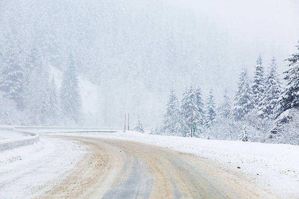 istock Snow Pack & Ice Highway Montana Mountain Pass Freeway Winter 468713209