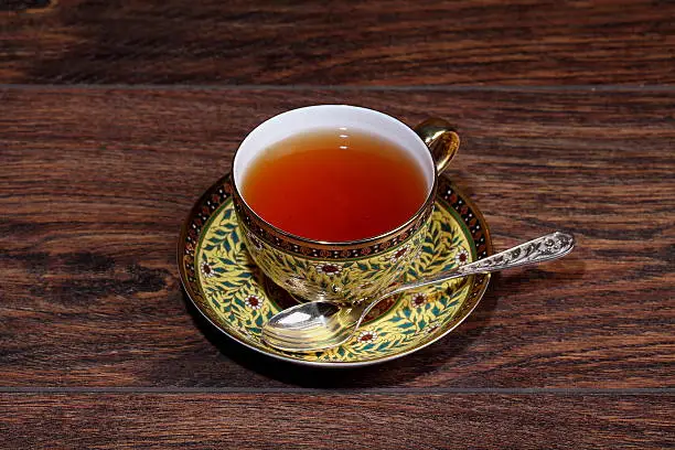 Cup of tea  on a wooden background