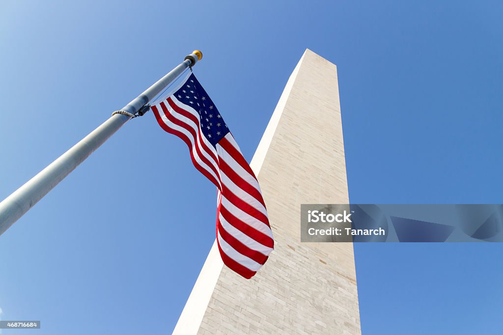 Washington monument Washington monument and the USA flag. 2015 Stock Photo