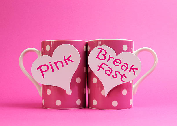 istock Pink Breakfast polka dot coffee mugs for charity awareness. 468717081