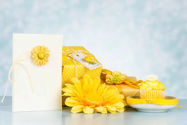 Photo of Greeting Card, Gifts and Cupcake