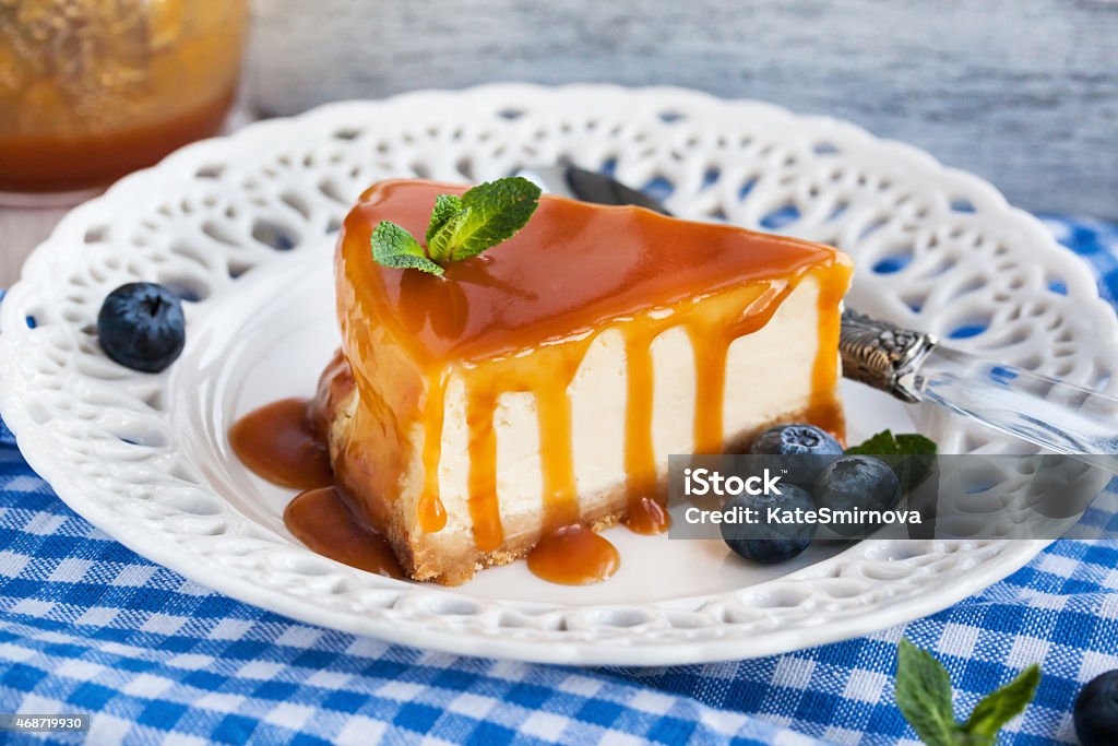 Cheesecake with caramel sauce Piece of delicious cheesecake with caramel sauce 2015 Stock Photo