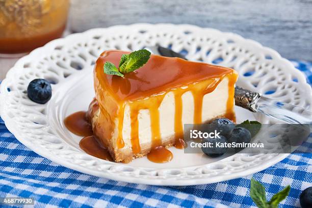 Cheesecake With Caramel Sauce Stock Photo - Download Image Now - 2015, Baked Pastry Item, Bakery