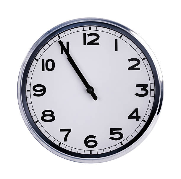 istock Large clock shows five minutes to eleven 468725301