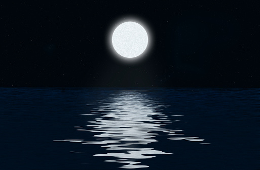 Moon, the stars and moonlit path on the water surface