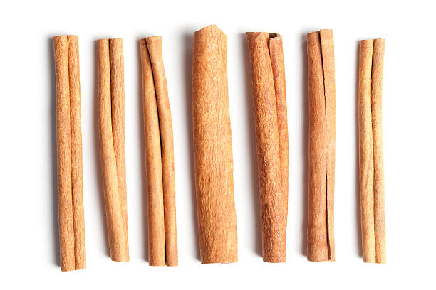 istock Close up of cinnamon sticks with clipping path 468728090