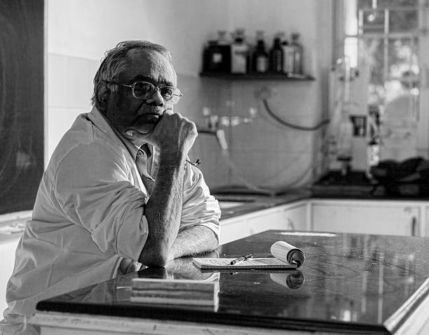 An Indian Doctor contemplates about his patient after a late night.
