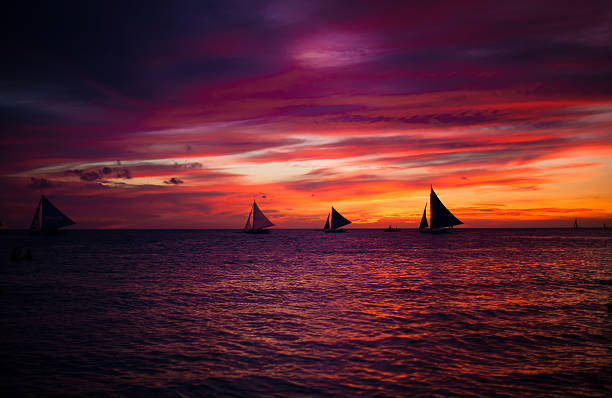 istock Incredible beautiful sunset with sailboat on the horizon 468731829