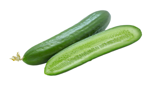 Beautiful photo of fresh cucumbers isolated on white background .
