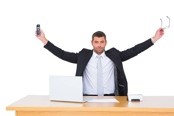 istock Businessman holding phone and glasses 468733314