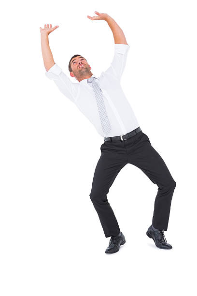 istock Businessman bending and pushing 468733696