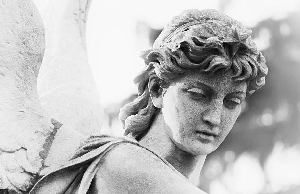 istock Vintage image of a sad angel on a cemetery 468734318
