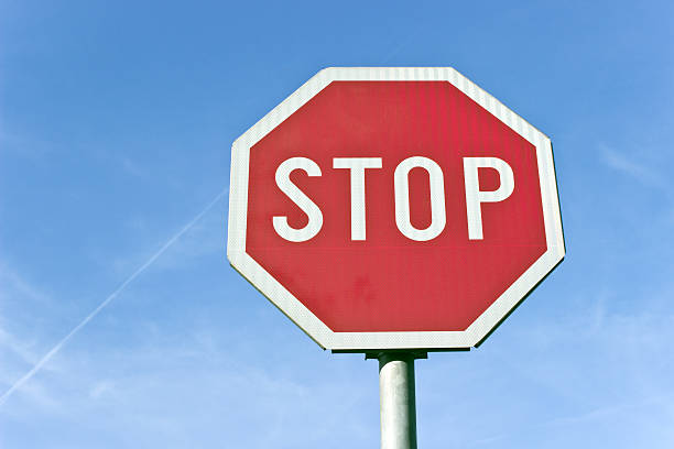 istock Stop road traffic sign over blue sky 468738563