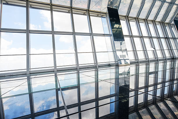 istock corridor of modern building and cityscape through window 468739431