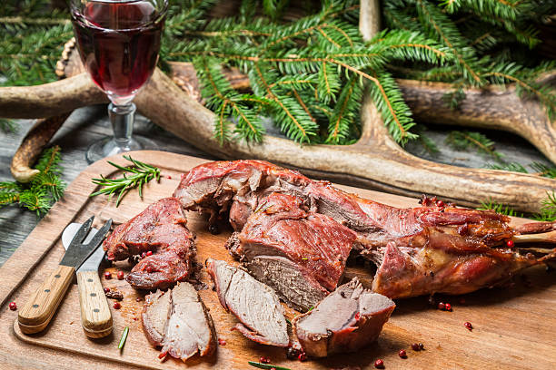 istock Fresh venison around with antlers and spruce 468743529