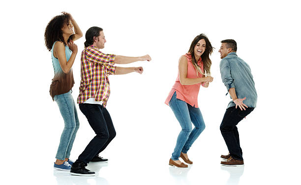 istock Smiling four friends dancing together 468747560