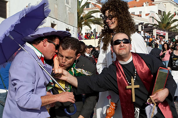 сатира для гей брак, во время парада carnival - false priest стоковые фото и изображения