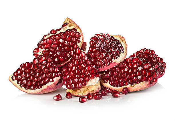 istock Ripe pomegranates isolated on a white background. 468748474